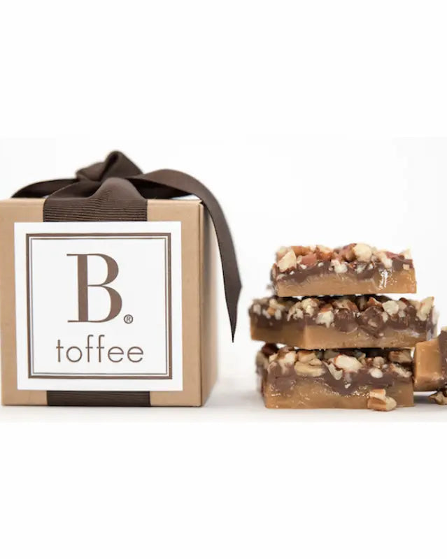 B toffee packaging with a stack of toffee pieces on a white background