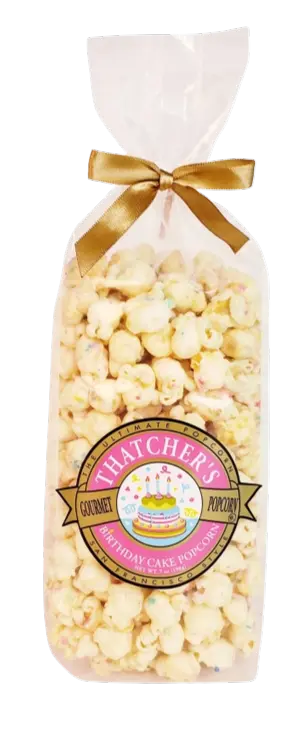 Bag of Thatcher's Gourmet Birthday Cake Popcorn with a gold ribbon on a white background