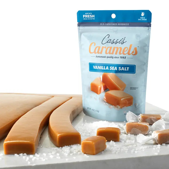 Packaged vanilla sea salt caramels with a clear background