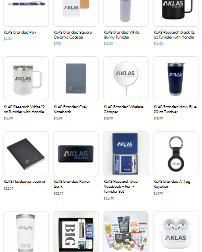 Various branded items including tumblers, notebooks, and keychains on a white background
