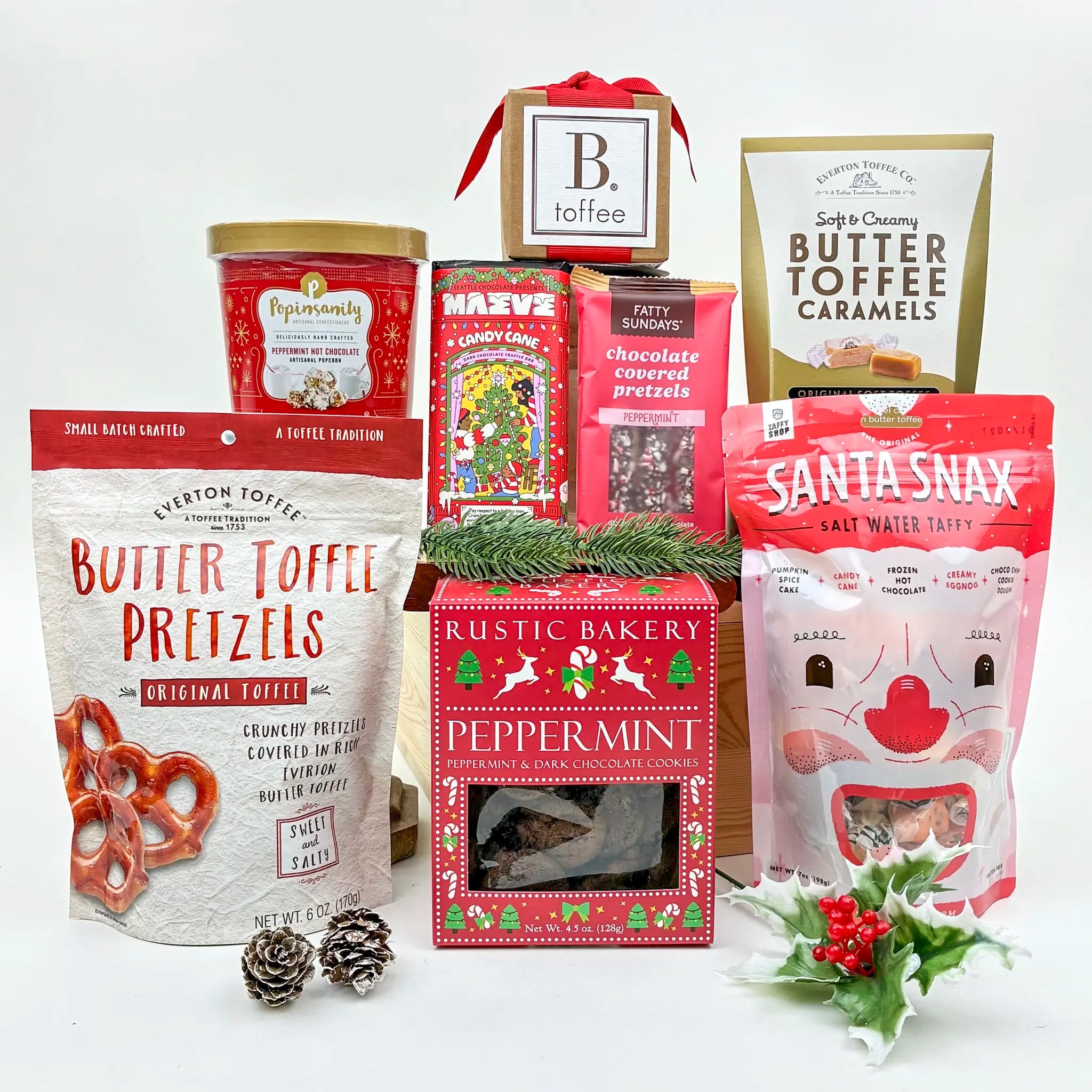 Assorted holiday-themed snack packages on a white background