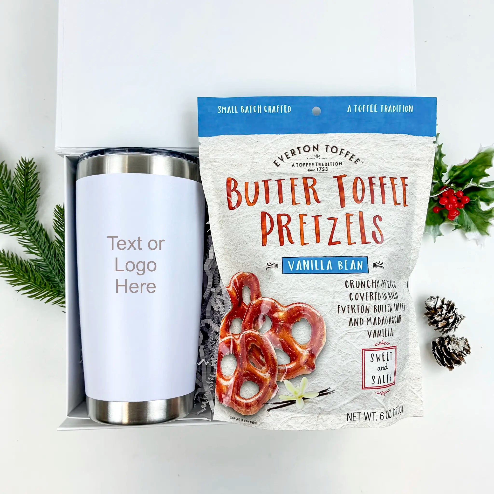 Bag of Butter Foffee Pretzels with a white tumbler on a light background