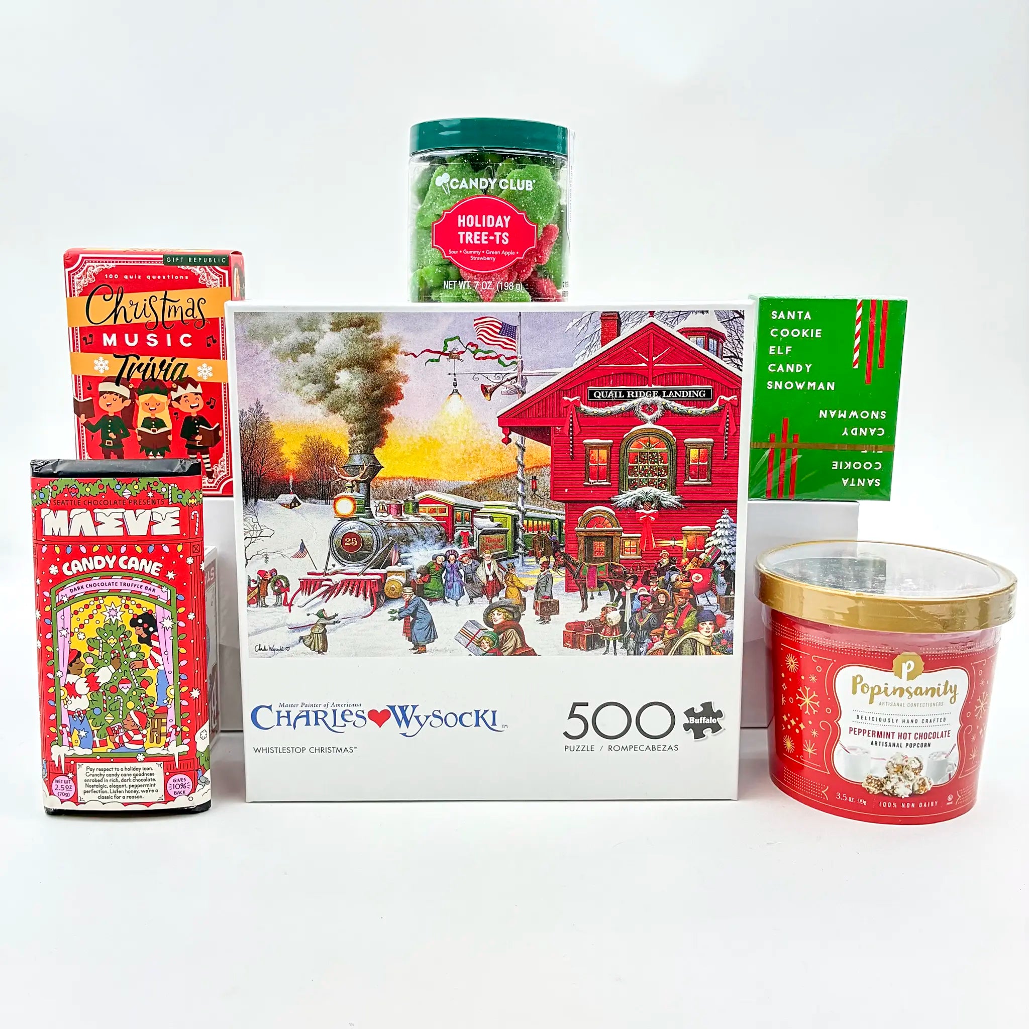 Collection of Christmas-themed products including a puzzle, candy, and popcorn on a white background
