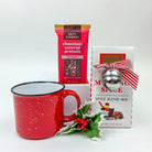 Red mug with a package of Fatty Sundays chocolate covered pretzels and a box of Moxie Spice spice blend mix on a white background.