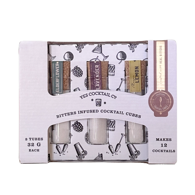 Packaged bitters-infused cocktail cubes with a decorative box on a white background