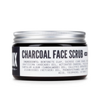 Jar of charcoal face scrub with a white label on a white background