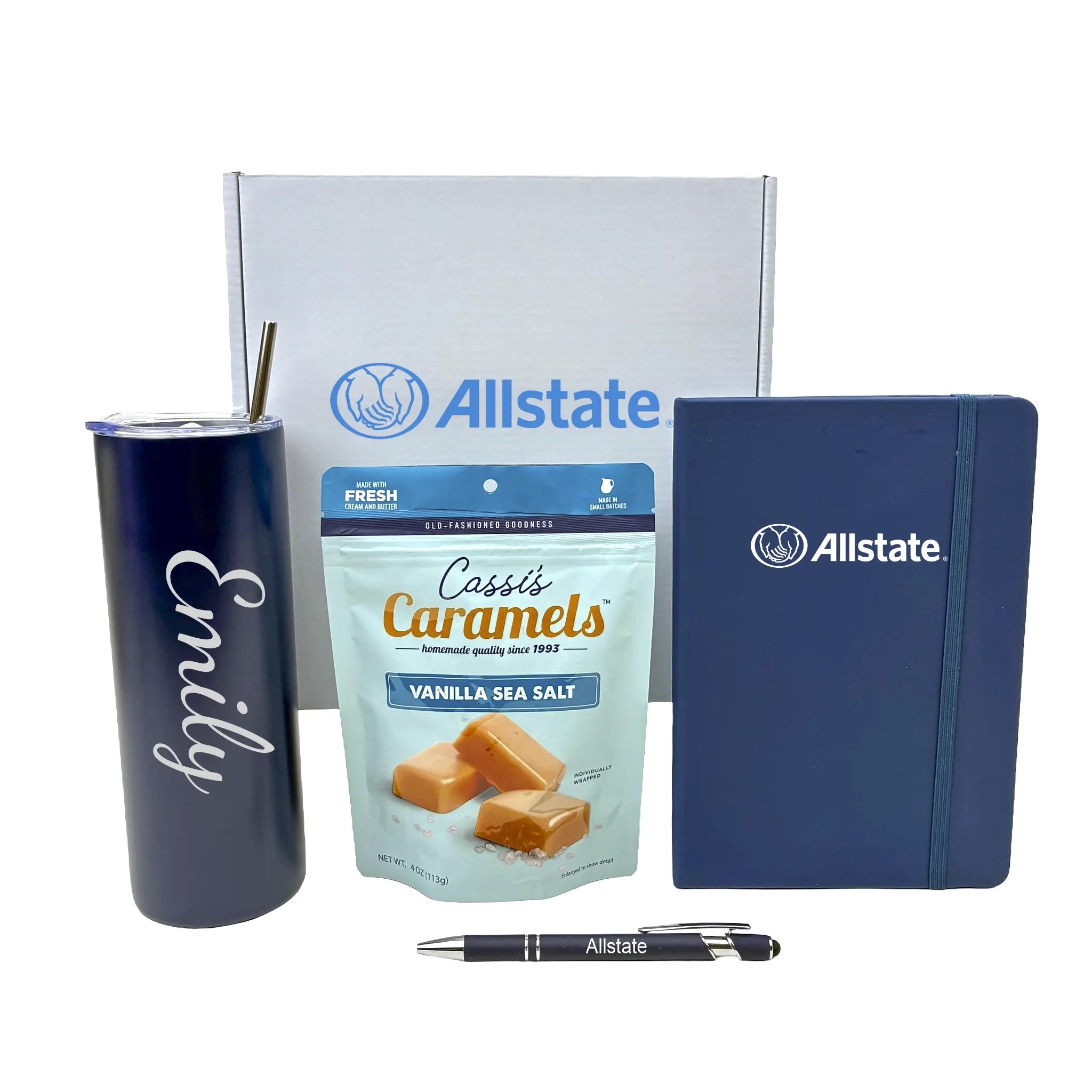 Allstate branded tumbler, notebook, pen, and caramels on a white background
