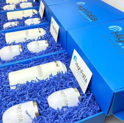 White chiller and wine tumblers arranged in a blue box, branded 'High Falls'.