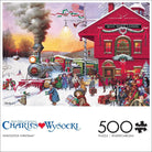 Jigsaw puzzle box featuring a Christmas scene with a train and people gathered around a red building, titled 'Whistlestop Christmas' by Charles Wysocki.