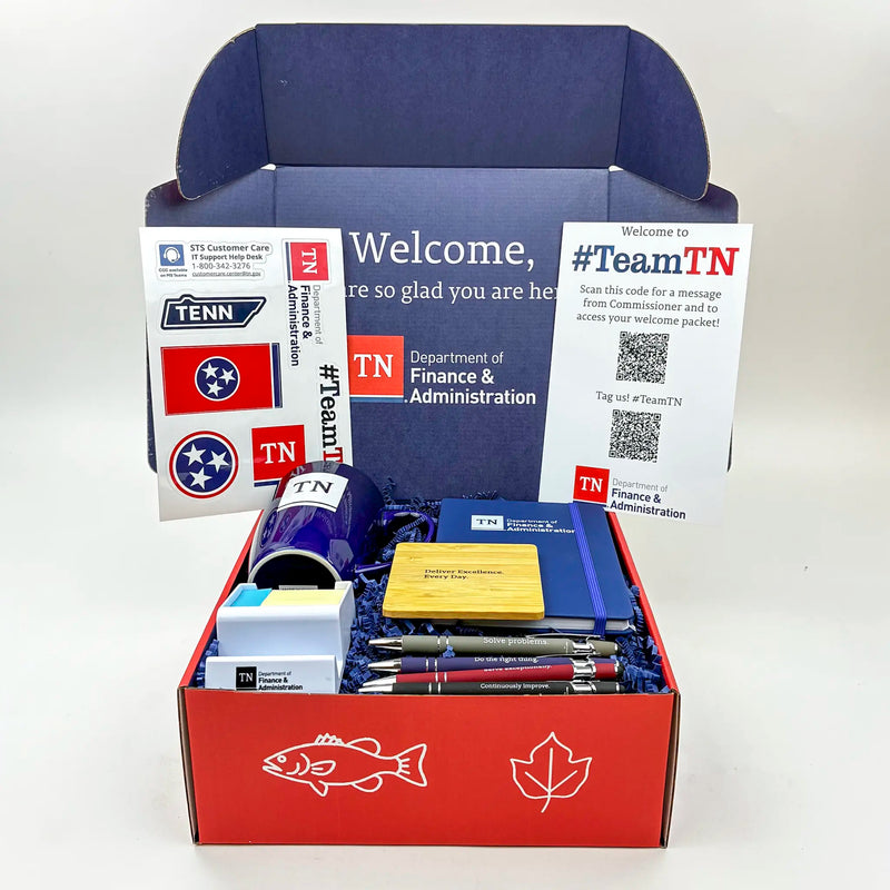 Box containing Tennessee Department of Finance & Administration branded items on a white background
