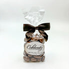 Bag of Coblentz Chocolate Company milk chocolate almonds with a brown ribbon on a white background