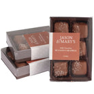Box of Jason & Mary's milk chocolate sea salt caramels on a white background