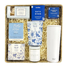 Spa gift set with bath bomb, cream, tea, and other items in a box 