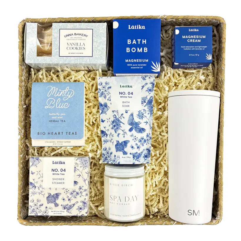 Spa gift set with bath bomb, cream, tea, and other items in a box 