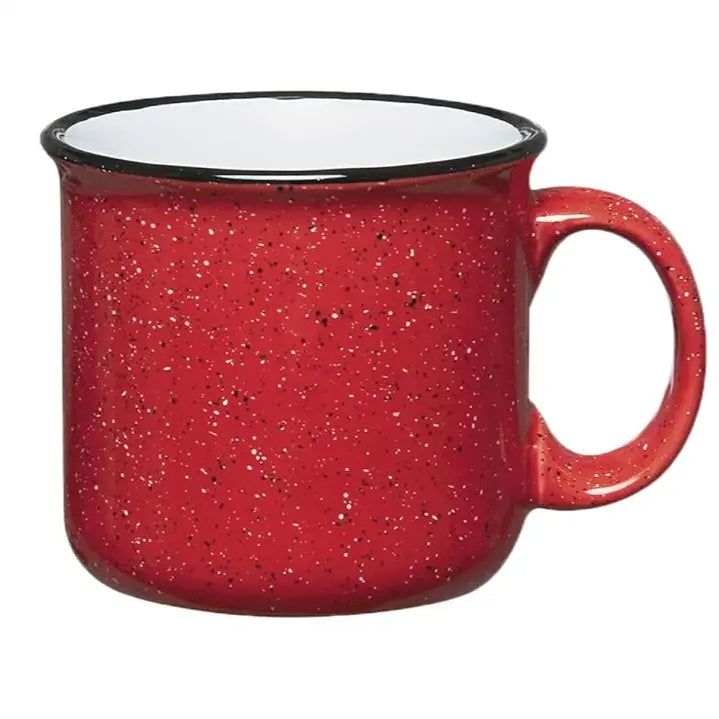 Red speckled mug with a black rim on a white background
