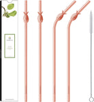 Set of rose gold straws with pineapple design, packaging, and cleaning brush on a white background.