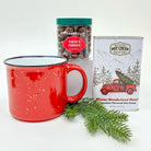 Red mug with a can of hot cocoa and a container of cookies on a white background