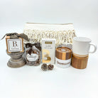 Collection of gift items including a mug, cookies, and a box on a white background